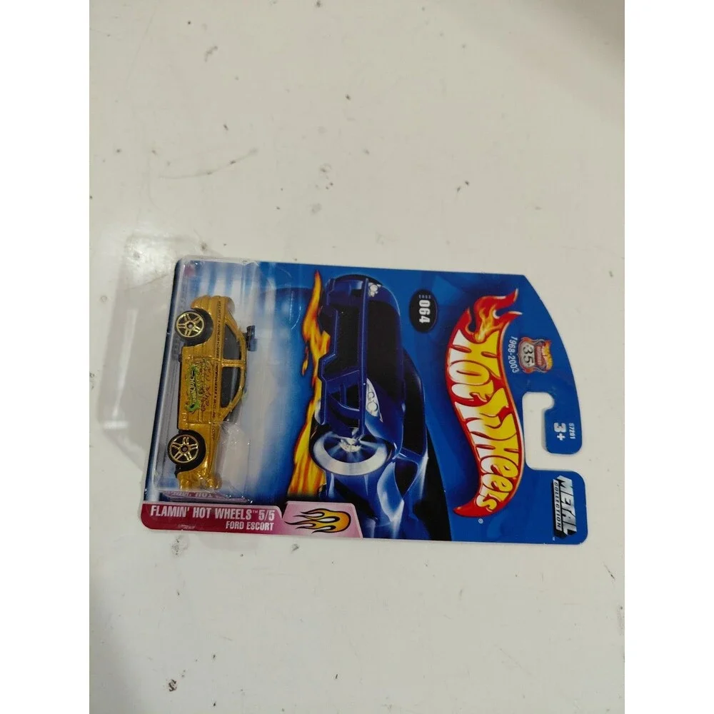 NIP Hot Wheels Flamin' Hot 1:64 Die Cast Ford Escort Rally Car